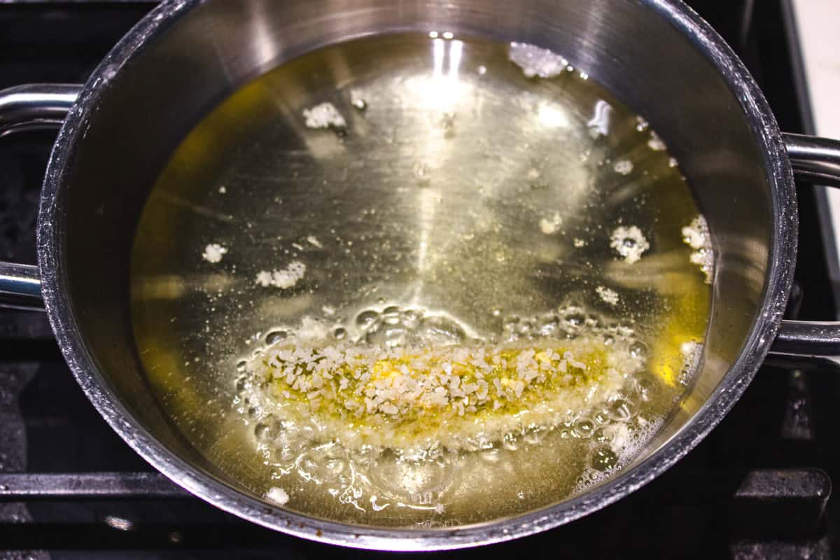 frying up pickles in hot oil 