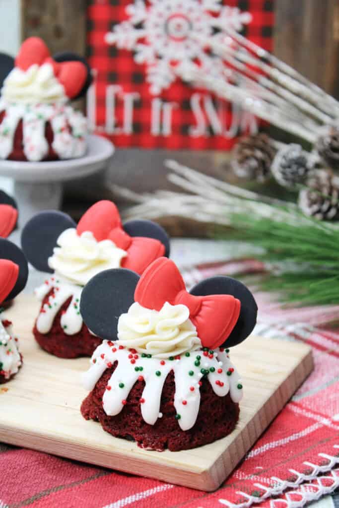 Minnie Mouse ear red velvet bundt cakes on a cutting board