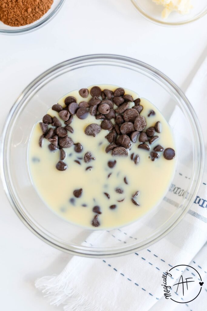 melting chocolate chips with condensed milk in a glass bowl